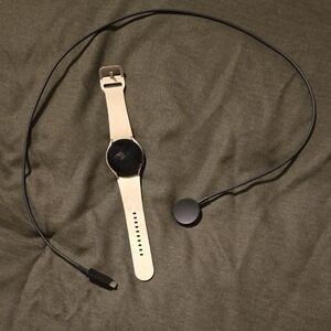 Samsung Smartwatch with Beige Band and Black Face